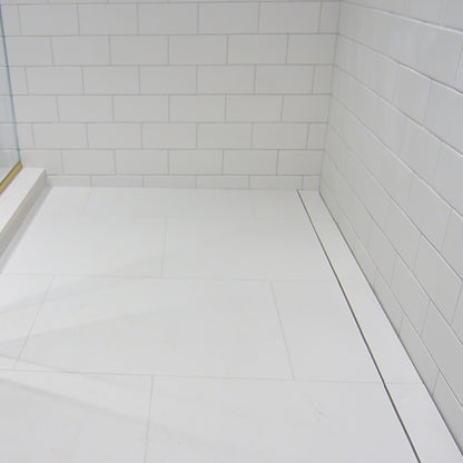 Drains Unlimited Wall-Mounted Linear Drain for Near-Wall Installation