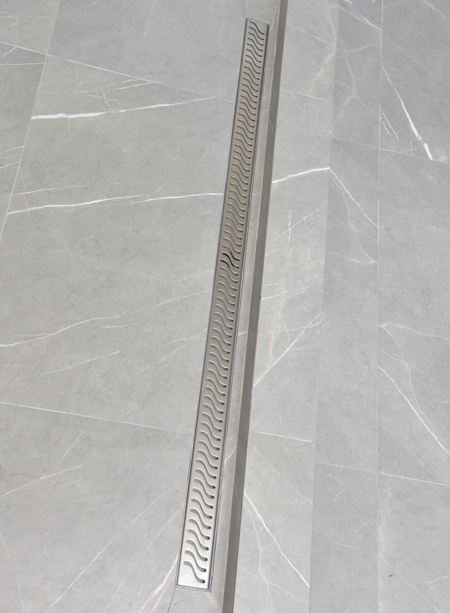 SereneDrains large 59 Inch linear shower drain, brushed stainless steel, Ocean Wave design