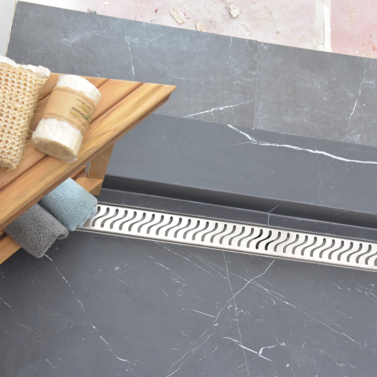 SereneDrains linear shower drain, brushed stainless steel, Ocean Wave design