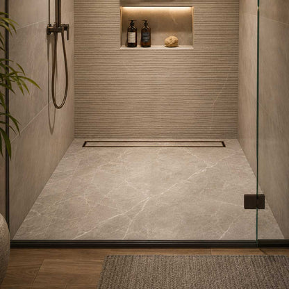 Oil Rubbed Bronze tile insert linear shower drain installed in a wet room