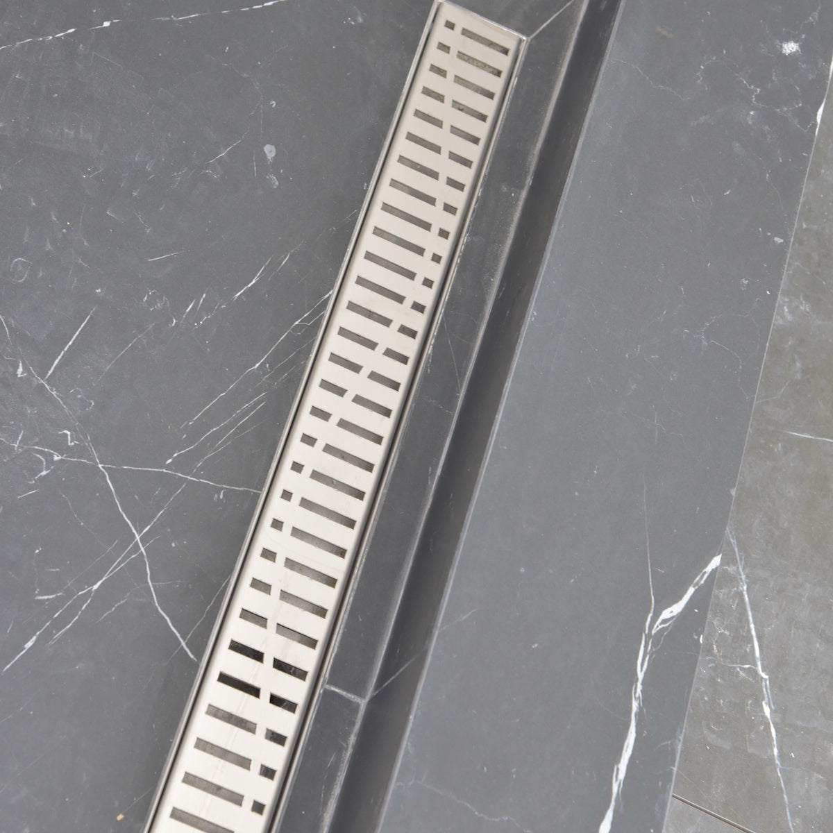 35" Linear Shower Drain, Brushed Stainless Steel, Wind Design – SereneDrains